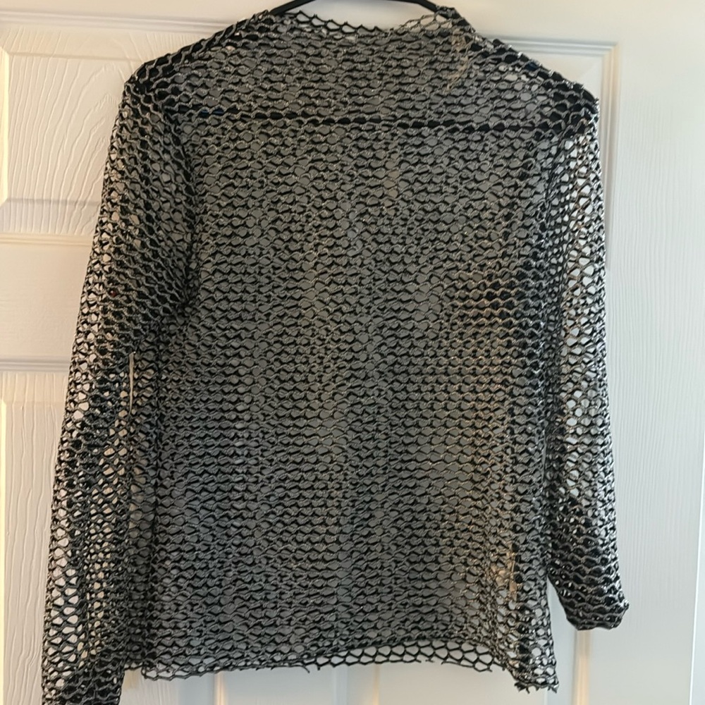 Black and silver mesh long sleeve shirt. Never worn